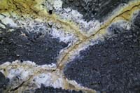 17-cracks_allows_minerals_to_seep_through_and_then_oxidize_changing_rock_color