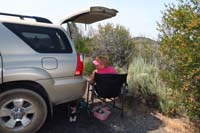 47-Mommy_hung_out_reading_a_book_dealing_with_the_heat-dog_hung_out_under_the_vehicle