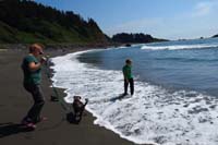 044-family_having_fun_on_the_ocean_beach