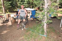016-Mommy_sitting_around_with_Rainier_tied_to_a_treat-afraid_he_might_chase_something