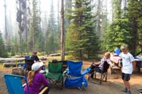 097-group_discusses_what_to_do_since_lots_of_thick_smoke