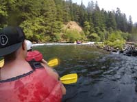 15-looking_back_at_rapid_while_another_raft_travels_through