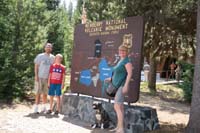 003-instead_family_photo_in_from_of_visitor_center-dog_looks_thrilled