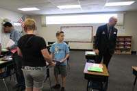 06-Kenny_and_his_teacher-issues_later_quelled_some_of_Kenny's_enthusiasm_for_school
