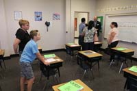 10-Kenny_picked_his_desk-nice_teacher,but_later_learned_very_strict_in_class_for_well-behaved_class
