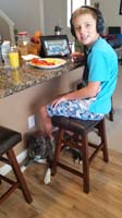 30-Kenny_having_his_breakfast-Rainier_likes_to_hang_out_by_our_feet