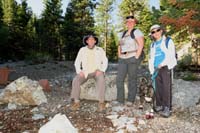 02-family_at_trailhead_at_end_of_Macks_Canyon_Rd-Rainier_has_protective_booties_since_sharp_limestone