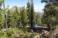 14-family_getting_tired_hiking_up_steep_slope-'misery_party_of_three'