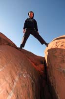 32-Kenny_is_so_comfortable_that_he_straddles_the_opening_between_rocks