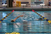 06-coach_swims_with_Kenny_monitoring_his_moves_underwater
