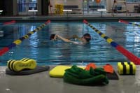08-Lindsey_helping_with_his_arm_sequence_for_butterfly