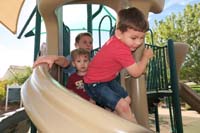 003-Kenny,Luke,Wade_on_a_local_park_slide