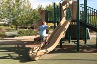 004-Kenny_runs_up_a_slide