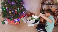 36-Kenny_gets_to_open_a_Christmas_present_early