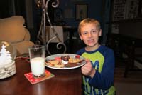 06-Kenny_present_the_cookies_for_'Santa',actually_Daddy
