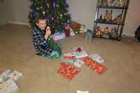 12-Kenny_checks_out_what_is_in_his_stocking