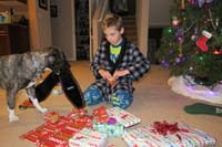 15-opening_gifts-Rainier_helps,but_actually_highly_involved_with_his_toys