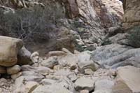37-scenic_drainage_with_polished_rocks,indication_that_a_lot_of_water_flows_here_on_occasion
