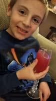 01-Kenny_is_so_refined,champagne_glass_with_juice
