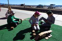 22-Kenny_playing_blocks_with_Lexi_and_Sarah_before_Rail_Explorers_train_car_experience