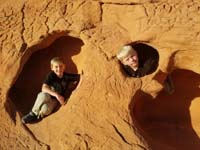 79-Kenny_and_Noah_in_small_sandstone_caves_at_the_visitor_center