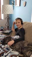 19-Kenny_plays_Minecraft_on_his_tablet_while_his_fur-brother_lays_with_him