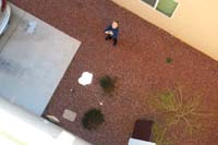 35-parachute_dropping_from_perspective_of_roof_top_deck
