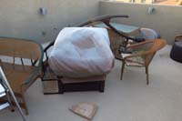 14-cover_almost_blew_off,everything_moved_around_the_rooftop_deck,15lb_stone_paver_thrown_off_cover