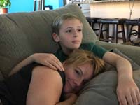 47-Kenny_cuddling_with_Mommy_while_watching_movie-makes_Mommy_very_happy