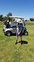 65-what_a_life-Grandpa_Duke_hangs_out_in_the_cart_while_Kenny_takes_a_swing