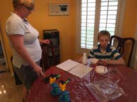 06-Kenny_now_works_on_building_a_contraption_Mommy_created