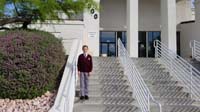 01-Kenny_in_front_of_school_in_full_uniform_for_Merit_Assembly