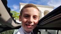 02-being_goofy_sticking_his_head_out_sunroof