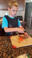 09-more_cooking_for_Kenny-cutting_carrots