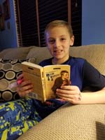 02-Kenny_enjoys_reading_Tom_Sawyer-class_allowed_to_say_n_word,but_only_in_class_related_to_book