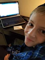 04-working_hard_on_his_homework_on_a_Sat_morning
