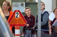 15-Daddy_sneaks_in_a_picture_of_Kenny_during_carline_pickup-Kenny's_expression_is_classic