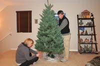 31-Mommy_and_Daddy_setting_up_the_Christmas_tree