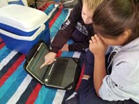 77-Kenny_helping_Nardia_with_her_math_homework