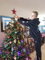 002-Kenny_enjoys_decorating_the_tree