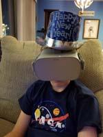 104-still_playing_with_the_Oculus_Go_at_10pm_and_wearing_New_Years_Eve_hat