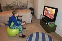 38-playing_an_XBox_One-X_from_last_Christmas_instead_of_his_new_toys-gee_whiz