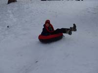 06-Kenny_tubing_down_the_hill