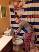 52-Kenny_plugged_up_the_toilet_so_he_gets_to_plunger_it