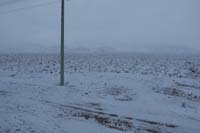 065-desert_behind_house_blanketed_with_snow-can't_see_peaks_since_still_snowing