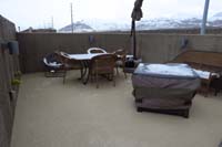 106-rooftop_deck_snow_almost_gone-house_too_warm