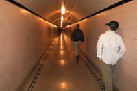 34-walking_through_the_long_tunnel_back_to_the_elevator-another_tour_approaching