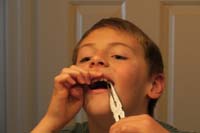 11-trying_to_pull_a_tooth_shell_using_needle_nosed_plyers-didn't_work-slipped_off