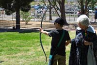 29-Kenny_tries_his_hand_at_shooting_a_bow_and_arrow