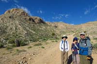 01-Kenny,Luba,Ed_ready_for_peak_in_far_distance-we_drove_dirt_road_to_this_point